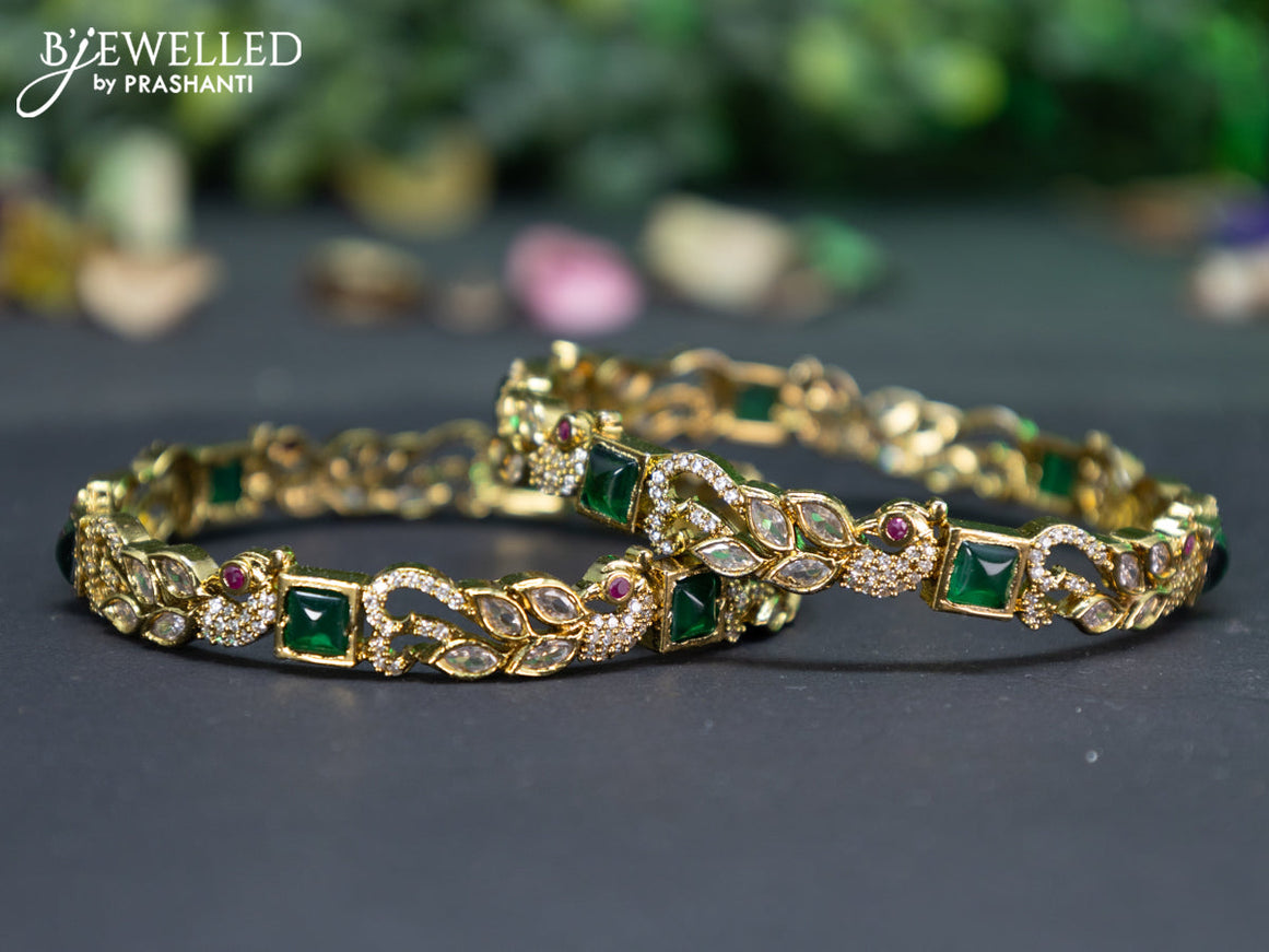 Victorian bangle peacock design with emerald and cz stones