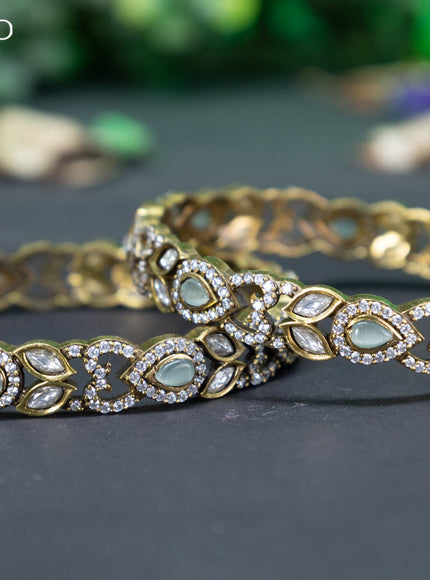 Victorian bangle with mint green and cz stones