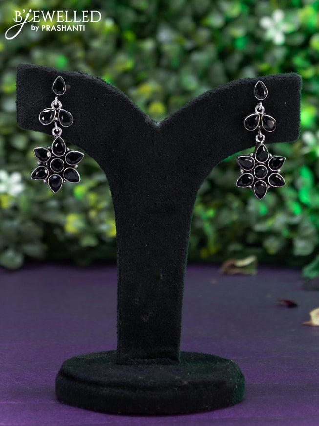 Oxidised floral design earring with black stones