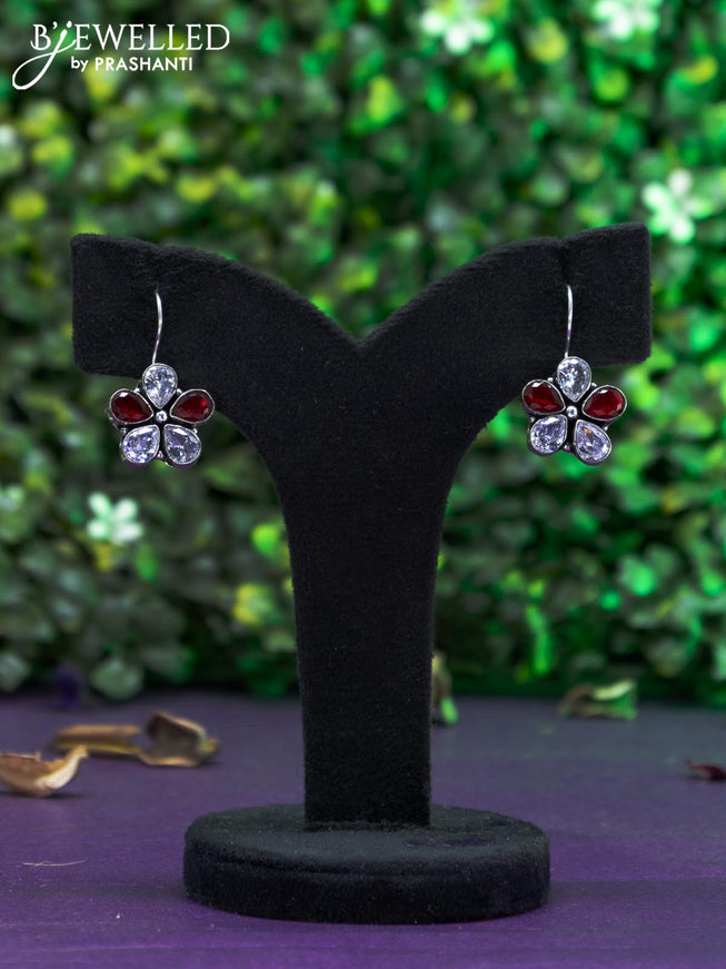 Oxidised hanging type earring with maroon and cz stones