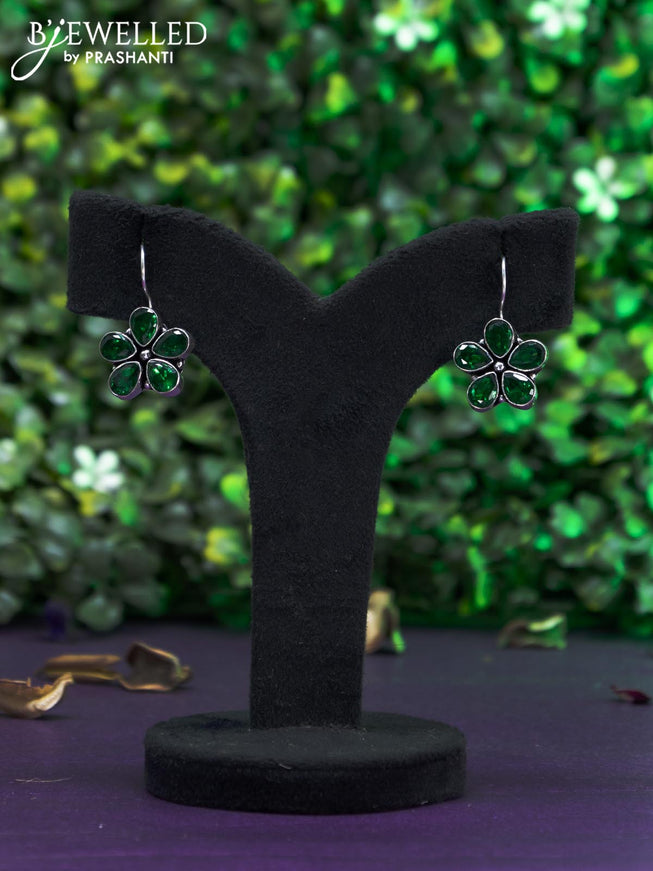 Oxidised hanging type earring with emerald stones