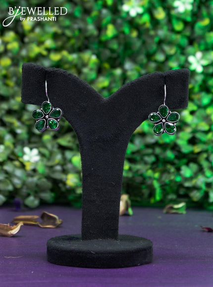 Oxidised hanging type earring with emerald stones