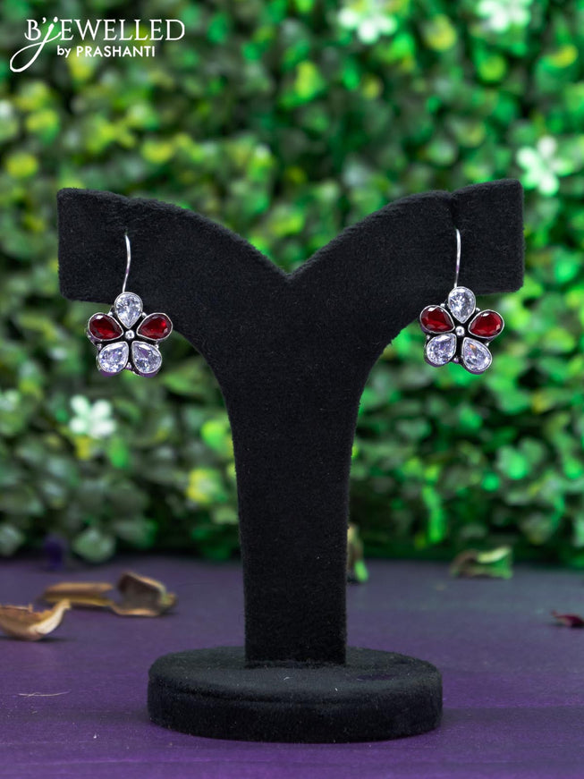 Oxidised hanging type earring with maroon and cz stones