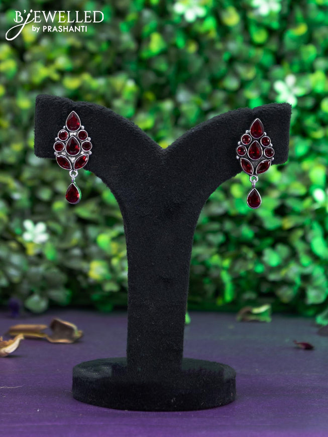 Oxidised earring with maroon stones and hanging