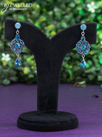 Oxidised earring with ice blue stones and hanging