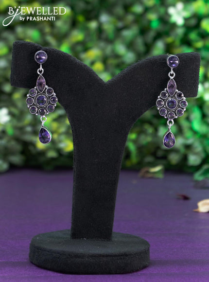 Oxidised earring with violet stones and hanging