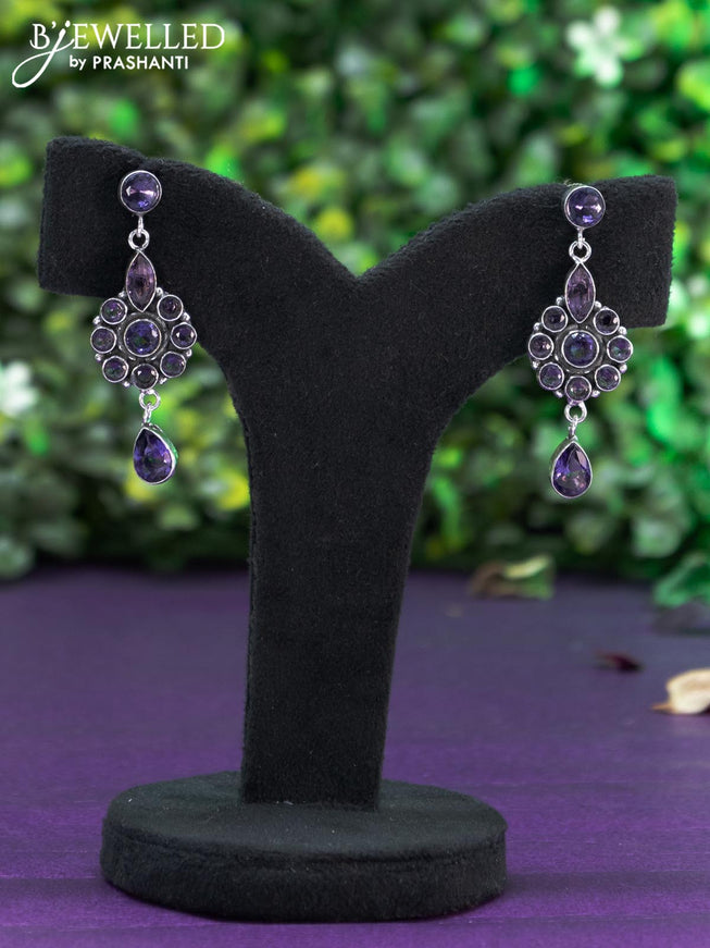 Oxidised earring with violet stones and hanging