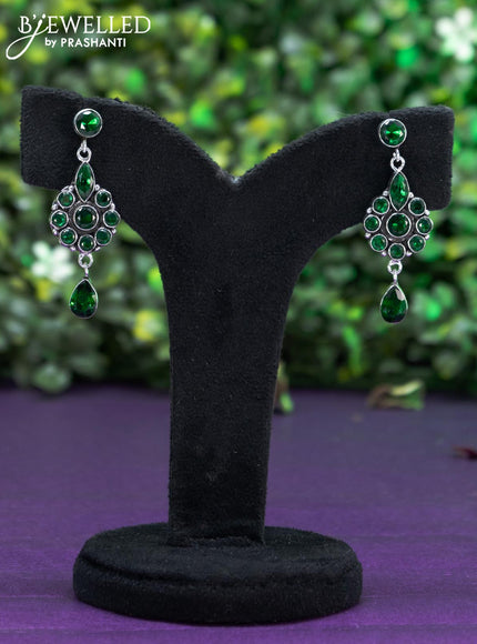 Oxidised earring with emerald stones and hanging