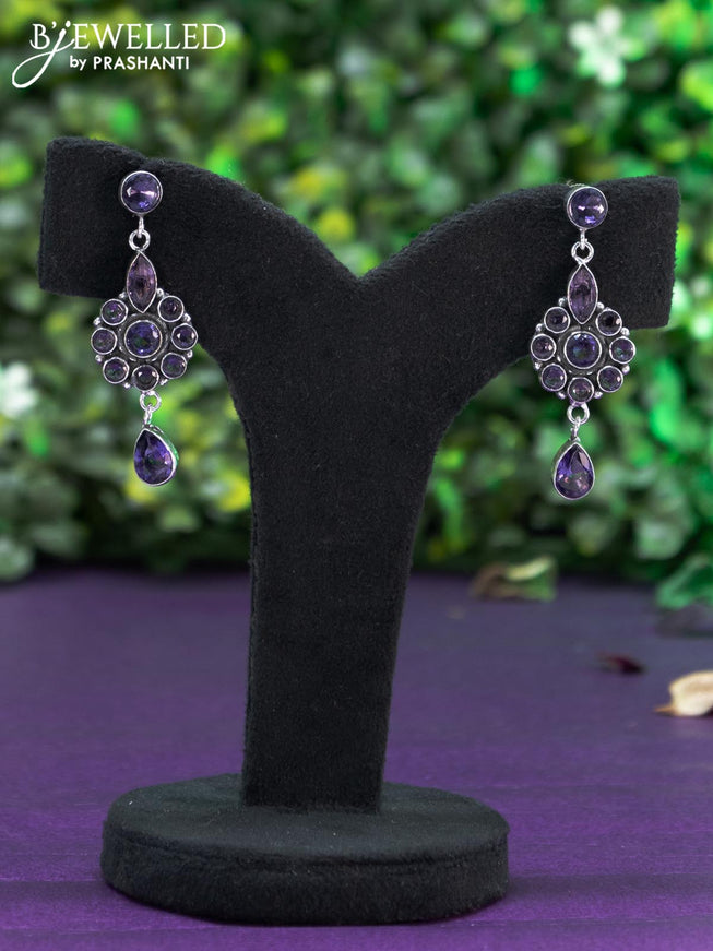 Oxidised earring with violet stones and hanging