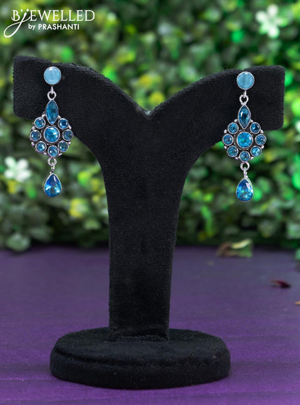 Oxidised earring with ice blue stones and hanging