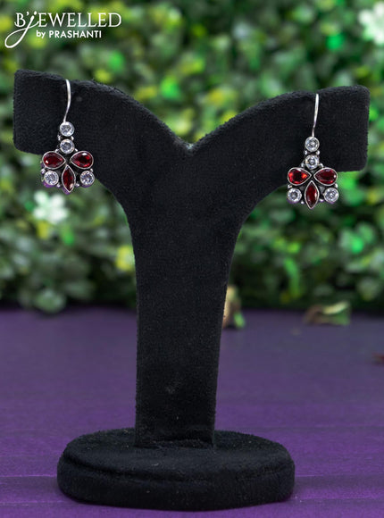 Oxidised hanging type earring with maroon and cz stones