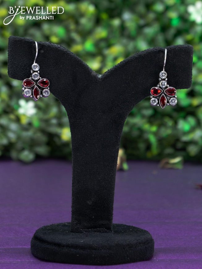 Oxidised hanging type earring with maroon and cz stones