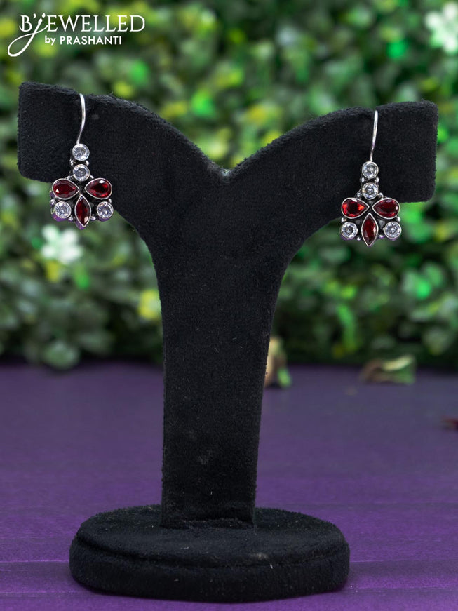 Oxidised hanging type earring with maroon and cz stones