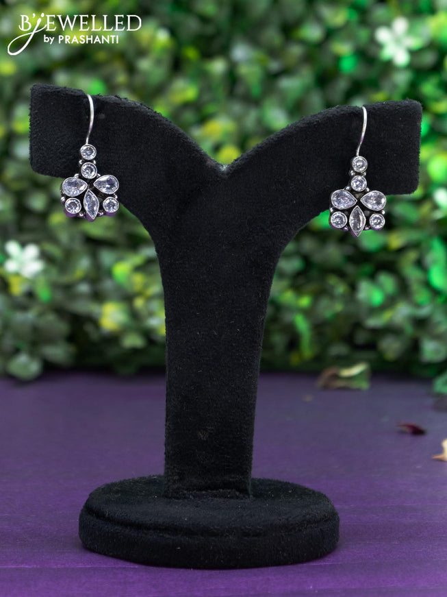 Oxidised hanging type earring with cz stones