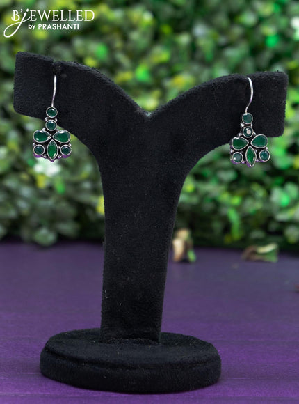 Oxidised hanging type earring with emerald stones