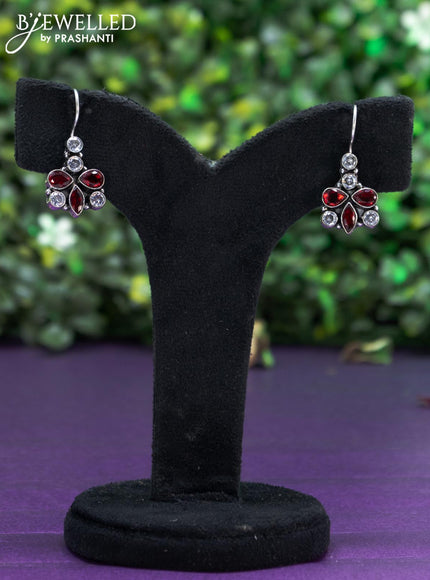 Oxidised hanging type earring with maroon and cz stones