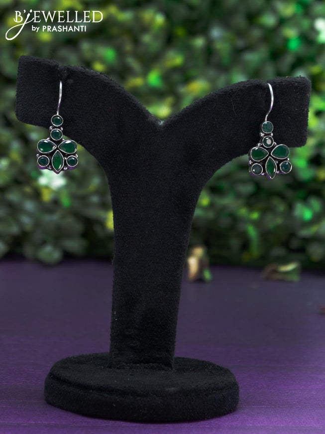 Oxidised hanging type earring with emerald stones