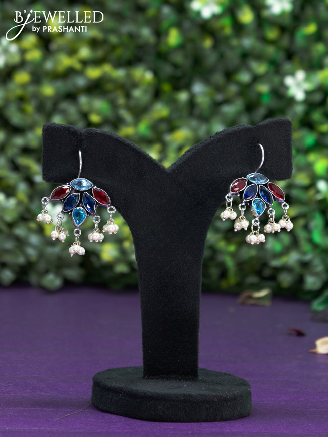 Oxidised hanging type earring with multi colour stones and pearl hanhing