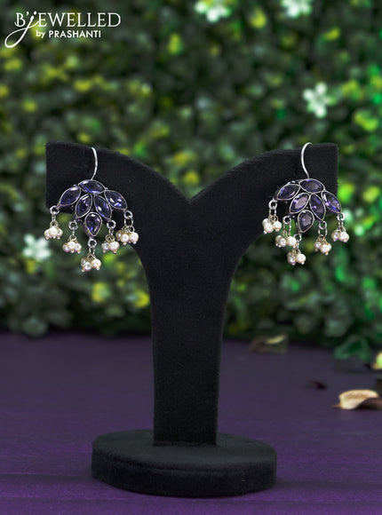 Oxidised hanging type earring with violet stones and pearl hanhing