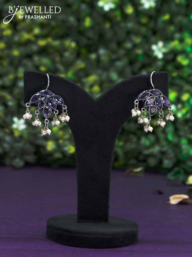 Oxidised hanging type earring with violet stones and pearl hanhing