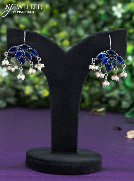 Oxidised hanging type earring with sapphire stones and pearl hanhing