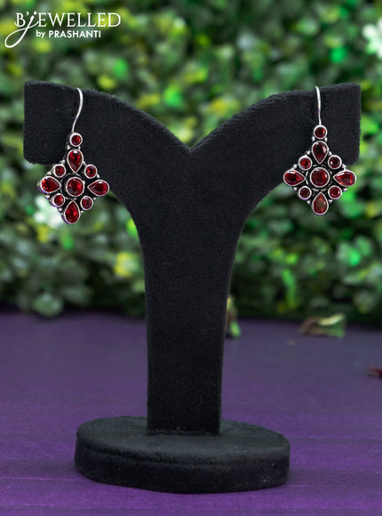 Oxidised hanging type earring with maroon stones