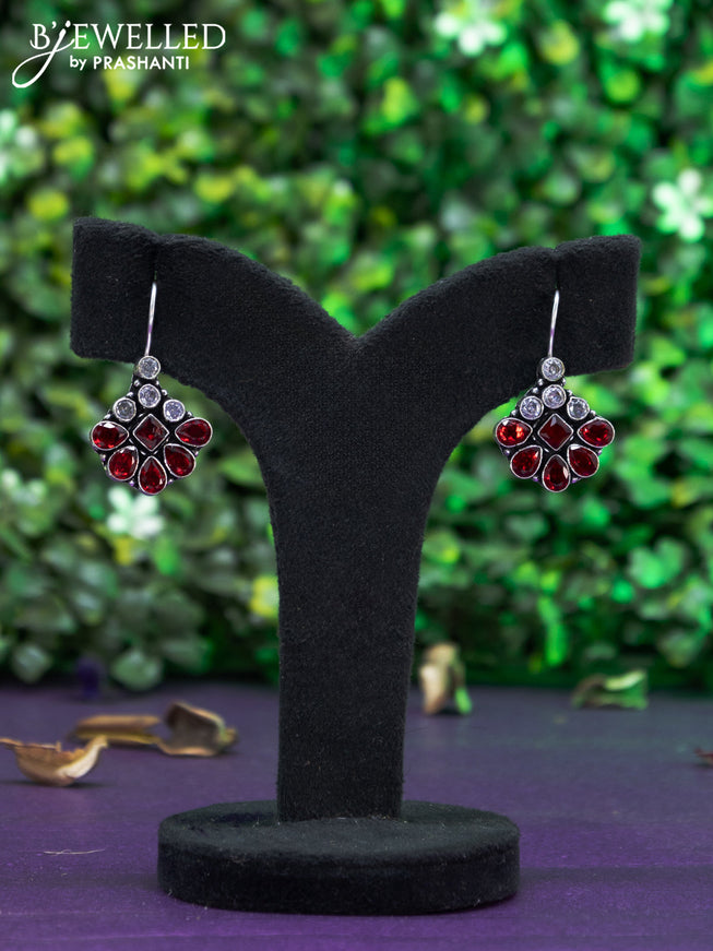 Oxidised hanging type earring with maroon and cz stones