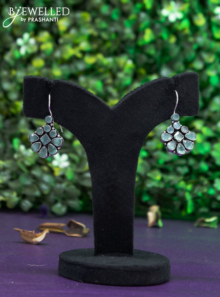 Oxidised hanging type earring with mint green stones