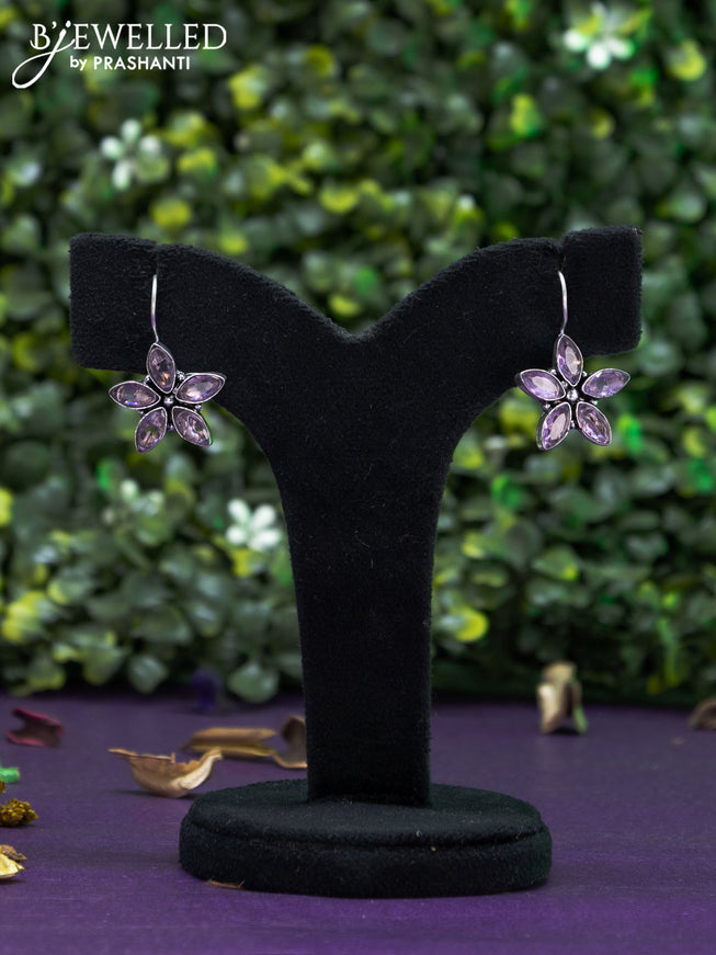 Oxidised hanging type earring floral design with violet stones