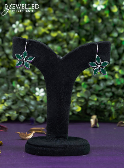 Oxidised hanging type earring floral design with emerald stones