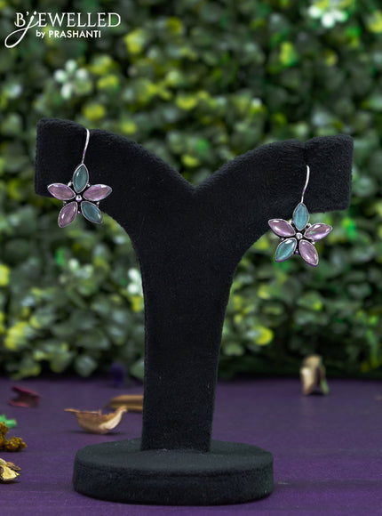 Oxidised hanging type earring floral design with mint green and baby pink stones