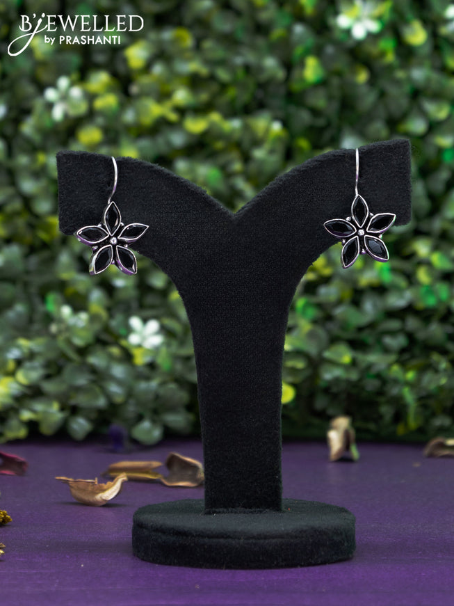 Oxidised hanging type earring floral design with black stones