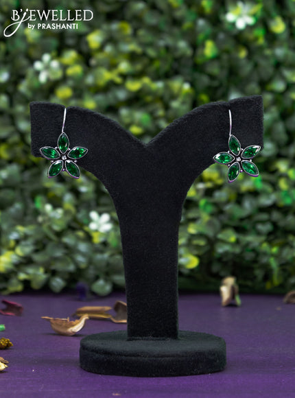 Oxidised hanging type earring floral design with emerald stones