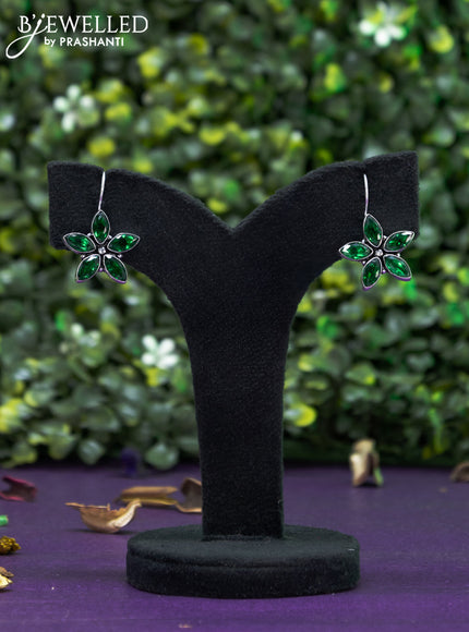 Oxidised hanging type earring floral design with emerald stones