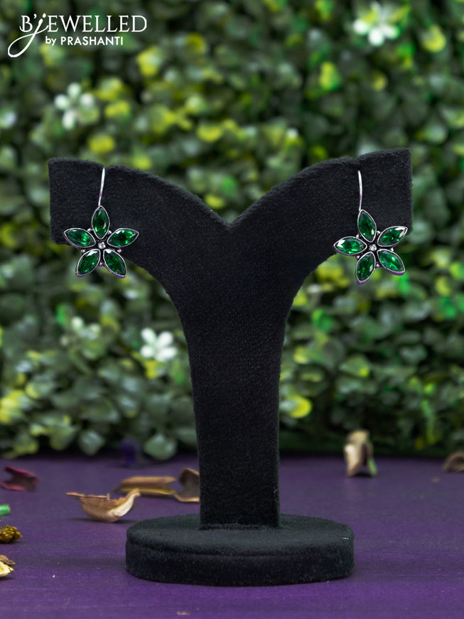 Oxidised hanging type earring floral design with emerald stones