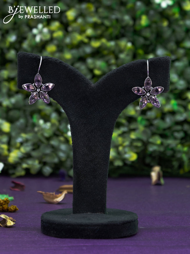 Oxidised hanging type earring floral design with violet stones