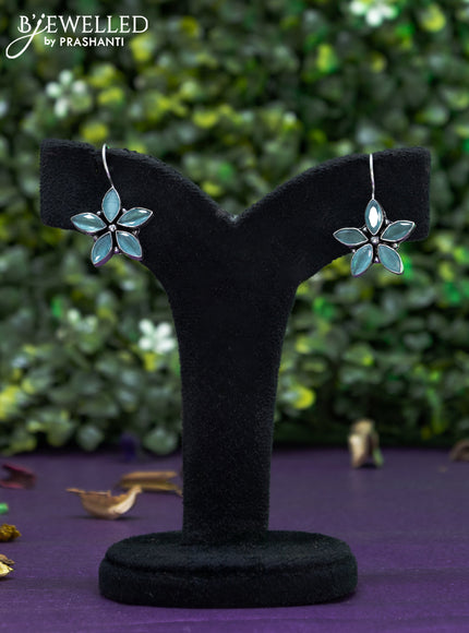 Oxidised hanging type earring floral design with mint green stones