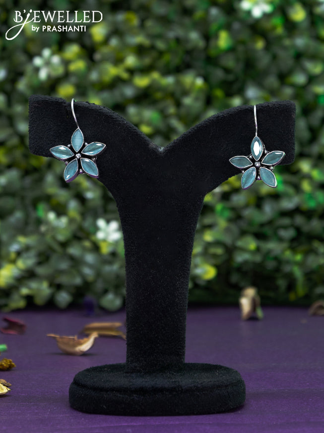 Oxidised hanging type earring floral design with mint green stones