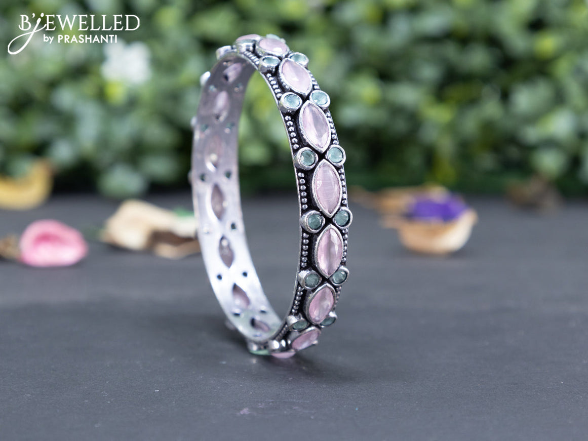 Oxidised bangle with mint green and baby pink stones