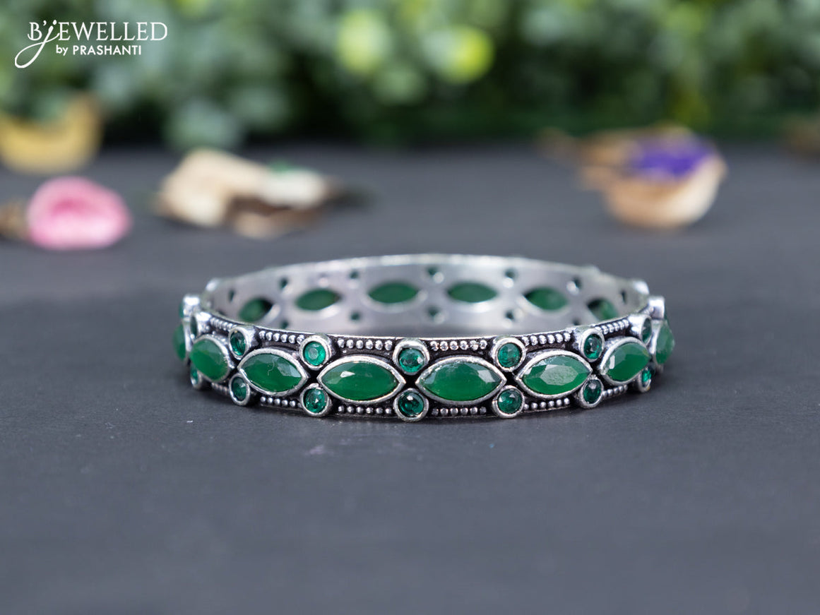 Oxidised bangle with emerald stones