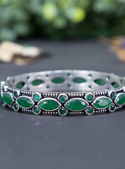 Oxidised bangle with emerald stones