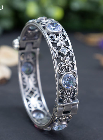 Oxidised screw type bangle with cz stones