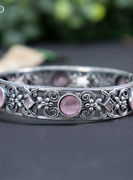 Oxidised screw type bangle with baby pink stones