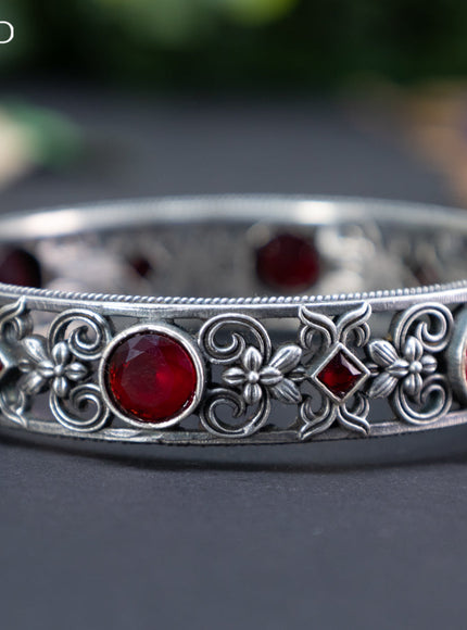 Oxidised screw type bangle with maroon stones