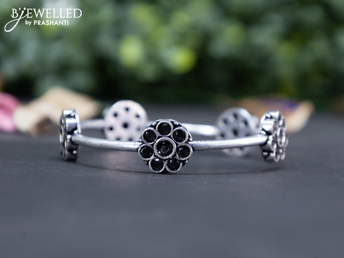 Oxidised floral design bangle with black stones