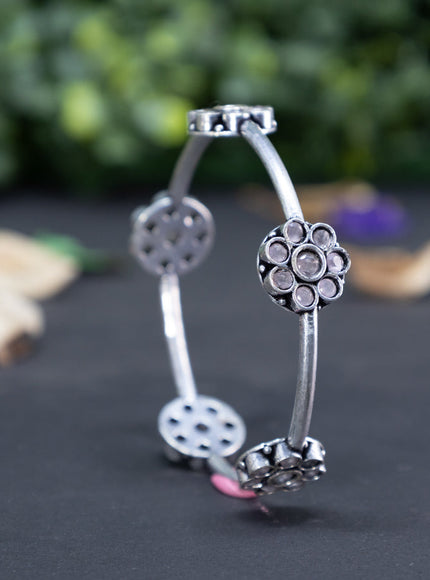 Oxidised floral design bangle with baby pink stones