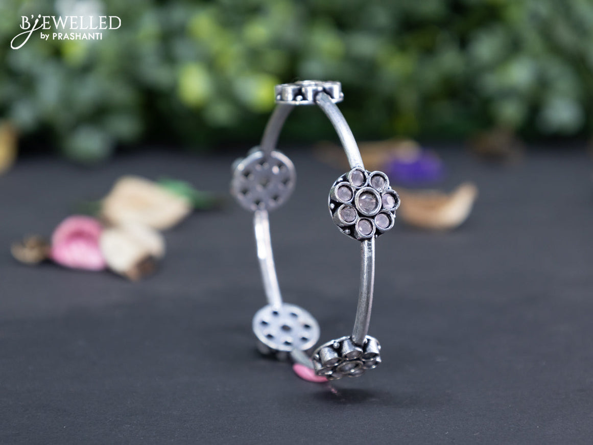 Oxidised floral design bangle with baby pink stones