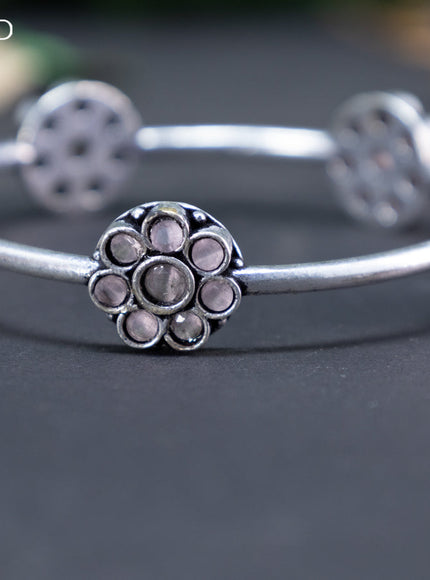 Oxidised floral design bangle with baby pink stones