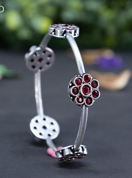 Oxidised floral design bangle with maroon stones