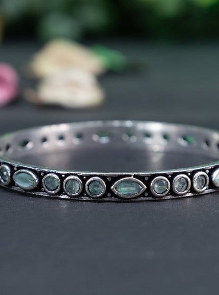 Oxidised bangle with mint green stones